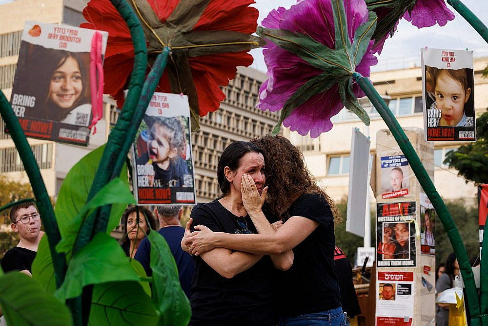 The hostage families crying for their loved ones.