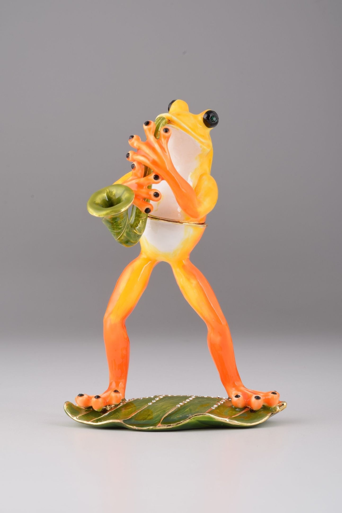Keren Kopal Frog Playing a Saxophone