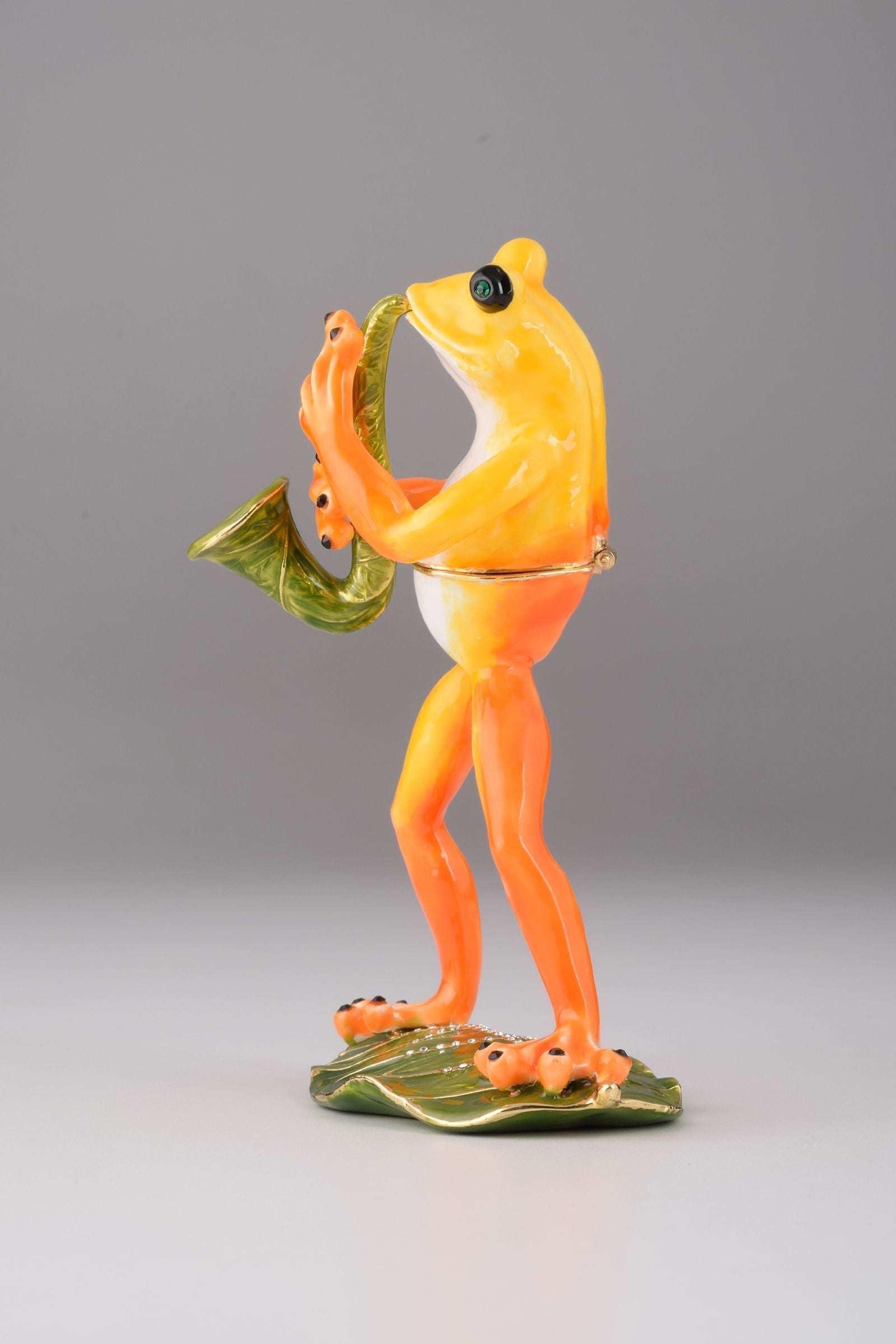 Keren Kopal Frog Playing a Saxophone