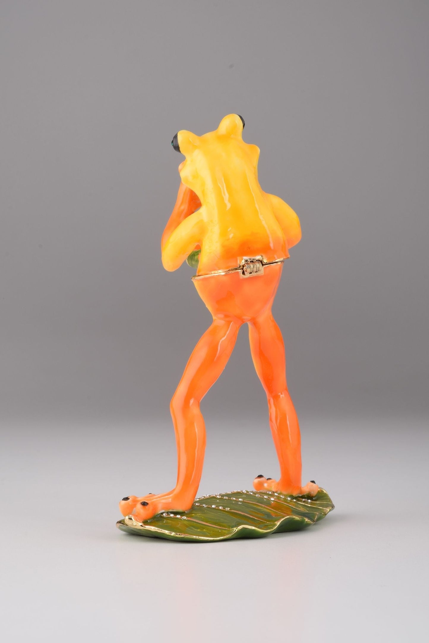 Keren Kopal Frog Playing a Saxophone