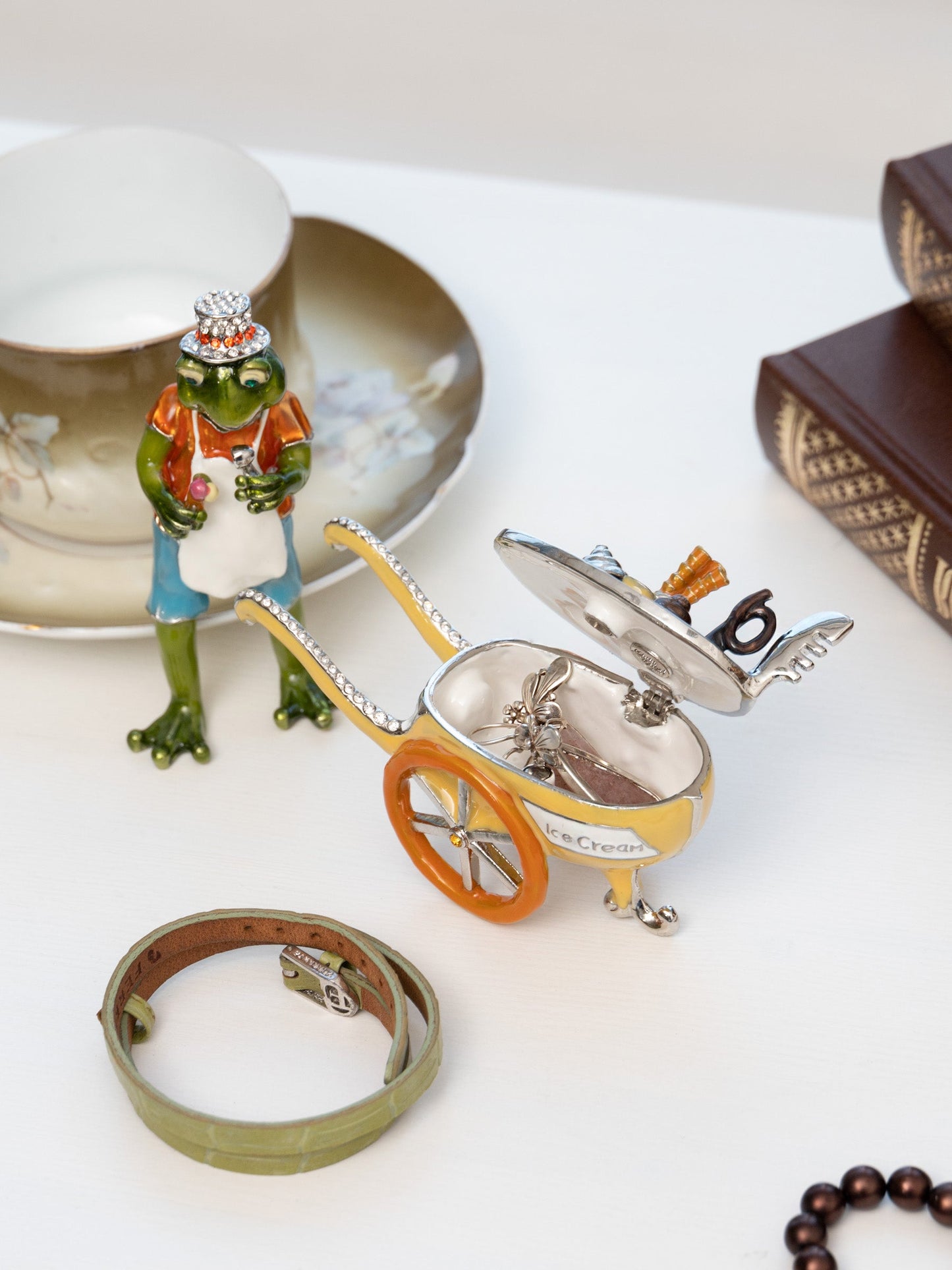 Keren Kopal Frog ice cream seller with a colorful ice cream cart