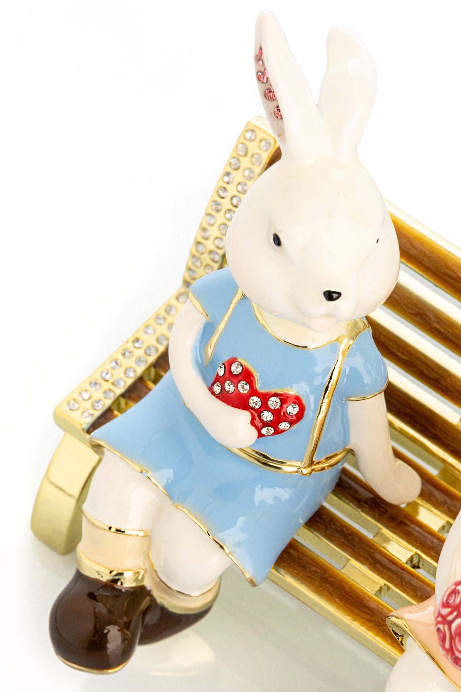 Keren Kopal 2 bunnies in love sitting on a bench, valentine flowers and chocolates